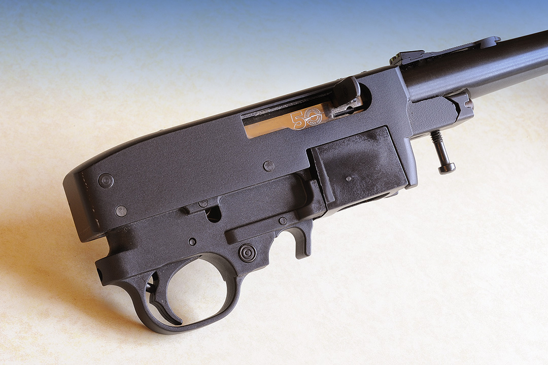 Out of the stock, the action is pure simplicity as engineered by the Ruger design team even back to 1964 and still it stands today. Note the single stock screw up front combined with the V-Block arrangement securing the barrel to the receiver.